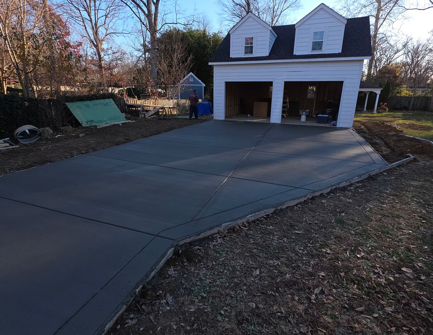 New concrete driveway to a detached garage