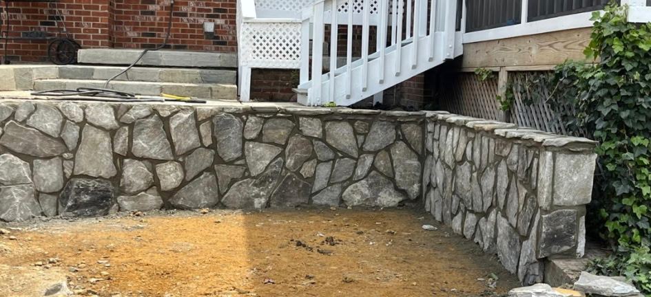 Mortared natural stone retaining wall